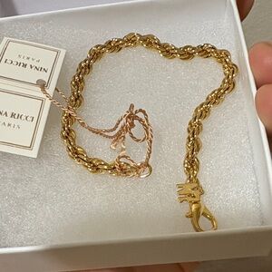 Nina Ricci Twisted Gold Bracelet